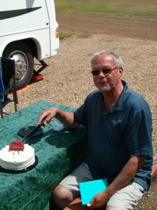 Retirement cake cutting by Larry Geddes after 32 years with JELD-WEN