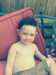 3rd Birthday party. Man he looks like me when I was young.LOL