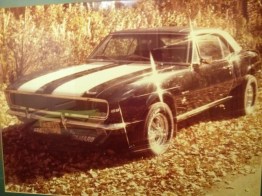 My 1967 Camaro RS/SS Black, white striping,front rotor brakes,rear folding seat, 12 bolt posi rare rare factory options.