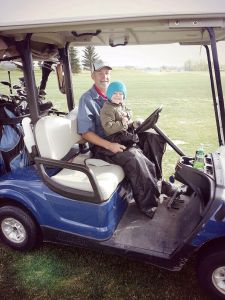 Jackson & I golfing earlier this year 