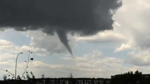 This cloud kept falling then lifting up again over and over. I don't believe it touched down though.