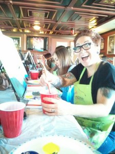 The group having fun learning to paint by numbers 