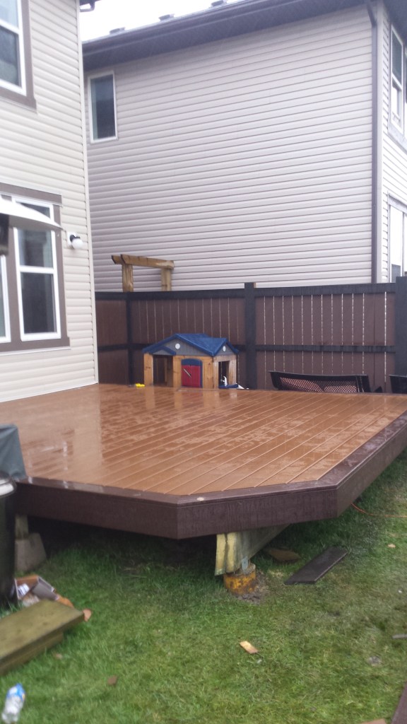 A wonderful looking deck just missing the stairs and railings