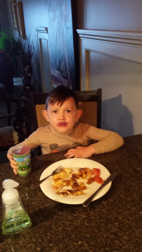 French toast, bacon and a mini Hitler look a like from Grammy's smoothie