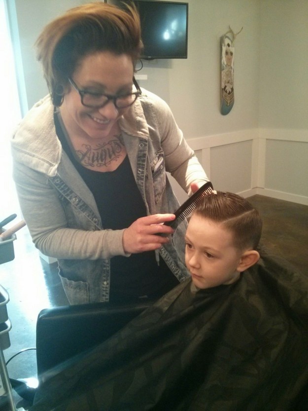 Jackson getting his haircut. New wainscoting chair rail in the background.