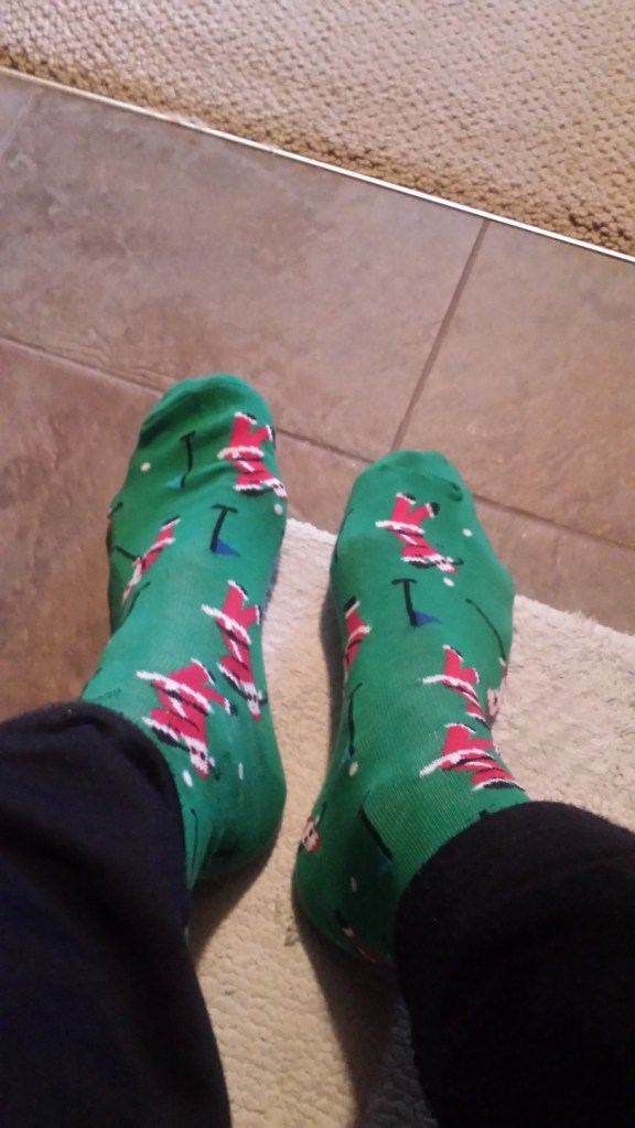 Santa playing golf socks 